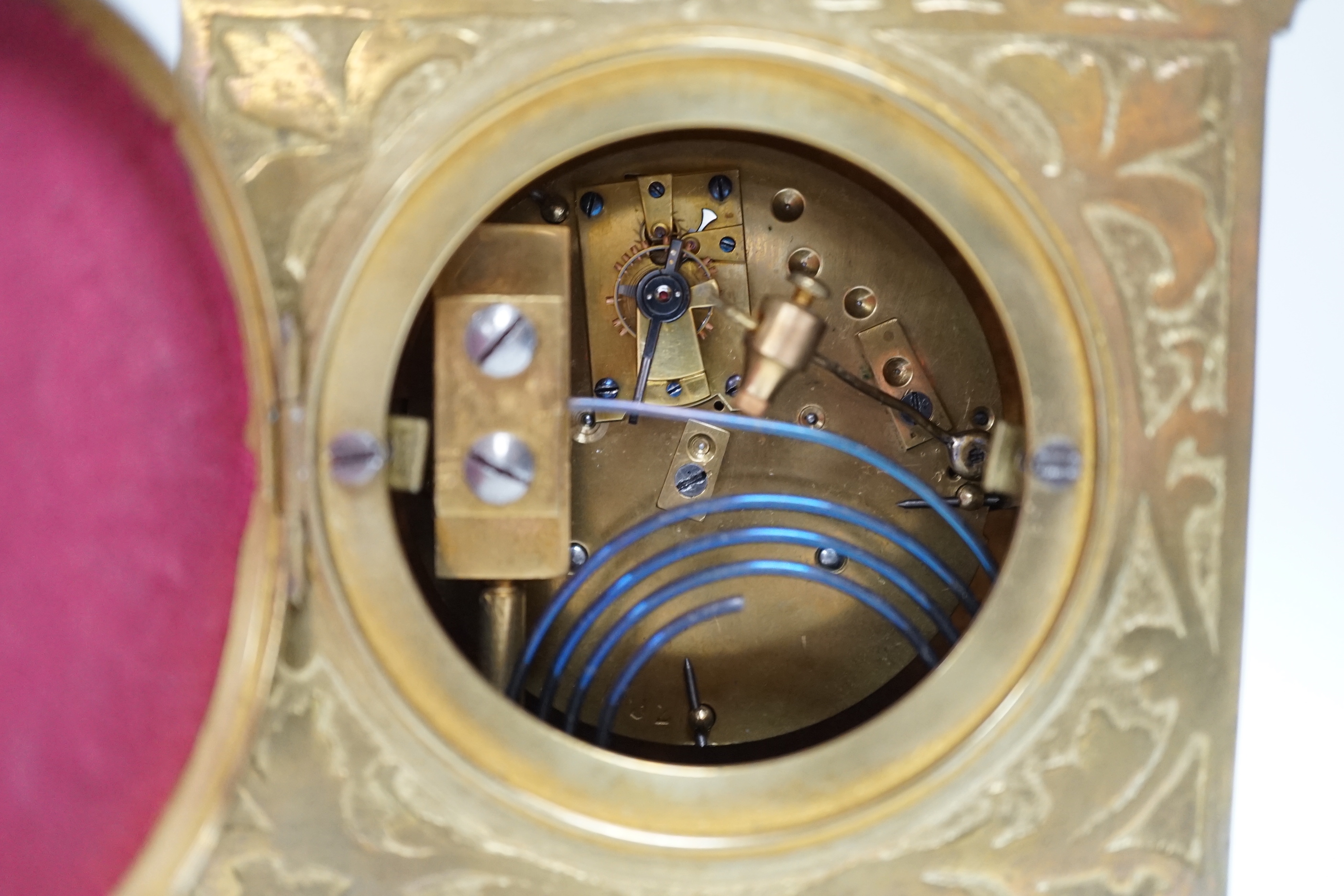 A French champlevé enamel mantel clock, 21cm